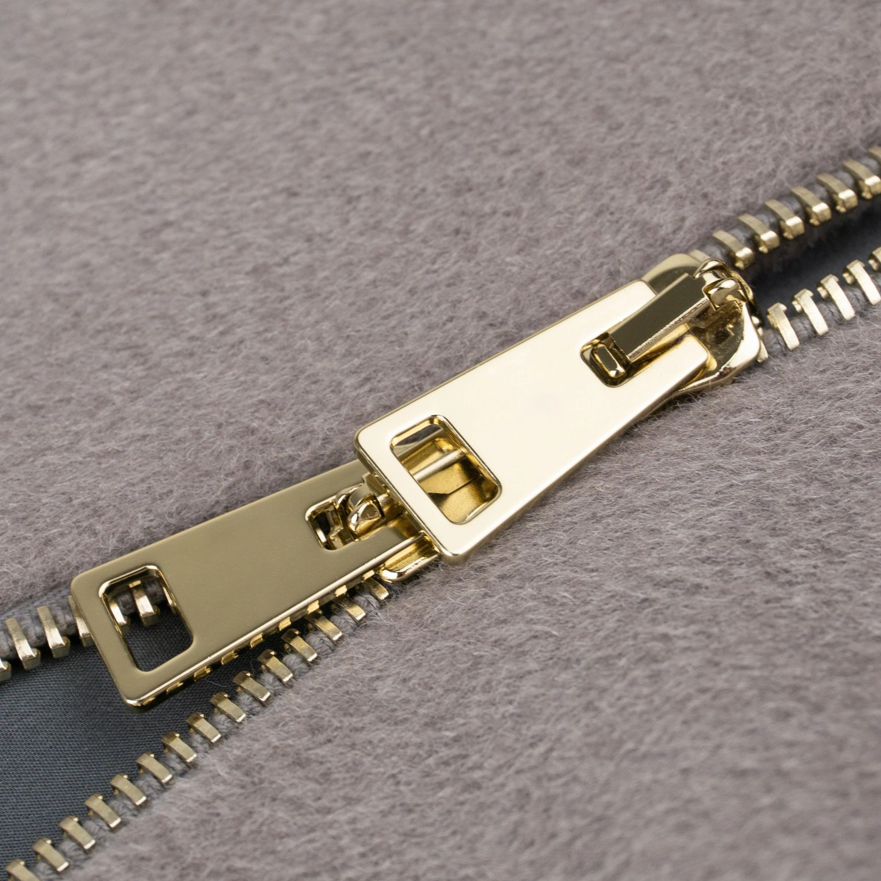 Close-up textile hardware detail representing garment tagging applications