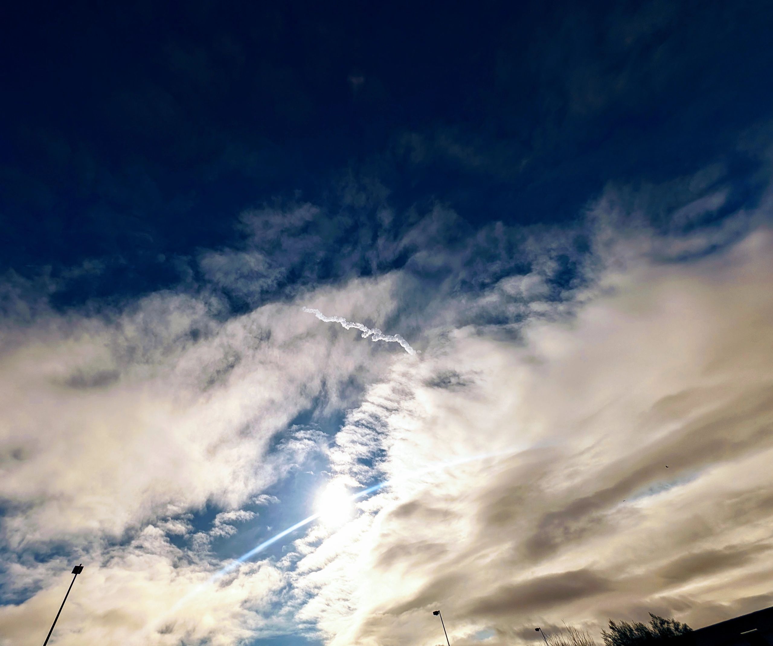 Rocket launching into the sky, representing Jay Group's satellite achievement